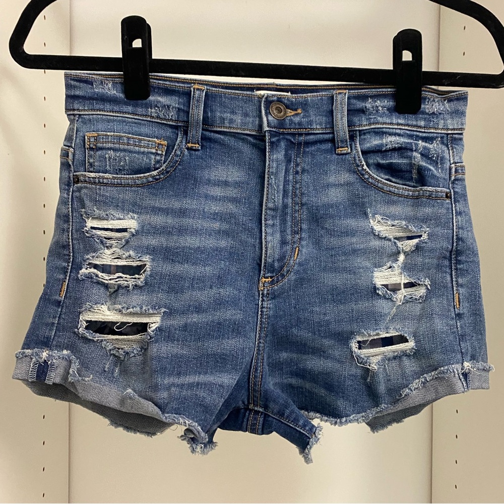 Sneak Peek High Rise Distressed Denim Shorts